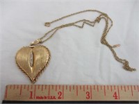 Ladies locket w/ chain. Letter of appraissal from9