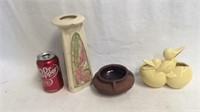3 pieces of pottery. The tall weller vase has a