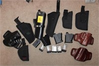 13pc Gun Holsters & Reloaders (magazines pictured