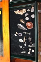 Contents of left side of display table; rocks