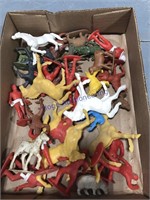 Plastic horses, men, animals
