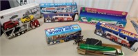 Box of miscellaneous toy trucks - total of 7