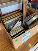 box of vintage picture frames