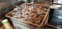 Tray with glassware, metal pitchers, foil sheets,