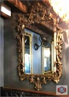 Gilded elaborate framed mirror 57x32" approx.