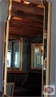 framed mirror black and gold 53x18" approx.