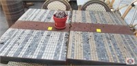 Table with mosaic top, metal post and metal trim