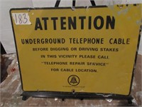 attention, underground telephone sign