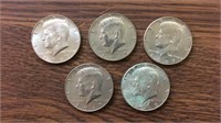 5 40% silver Kennedy half dollars: 4 1967, 1 1968