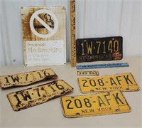 Group of vintage license plates and no smoking