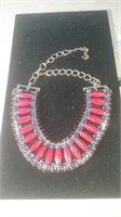 Beautiful gold tone necklace with red stones