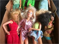 Assorted Barbie Dolls and Ken Doll