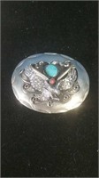 Silver with bird and turquoise and another Stone
