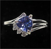 10K White gold prong set trilluim cut tanzanite