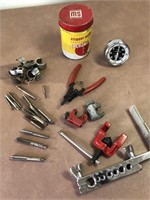 Easy out bits, flaring wrench, tachometer/can