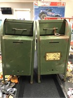 Two vintage green mail boxes.