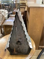 Primitive handmade birdhouse.