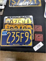 Motorcycle license plates.