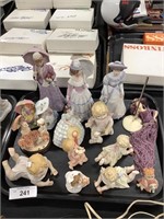 Women & children figurines.: