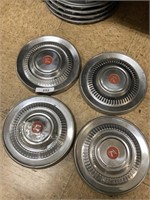 4 Rambler hubcaps.
