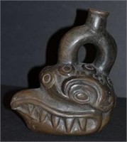 Pre-Columbian Peruvian Figural Stirrup Vessel