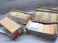 4 BOXES OF CANCELLED STAMPS