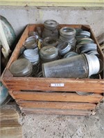 wooden crate full of misc mason jars & lids