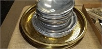 pewter bowls and brass trays
