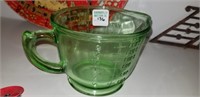 green depression measuring cup