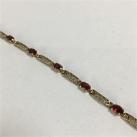 10k Gold Bracelet With Red Stones