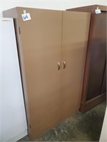 2 door brown metal cabinet