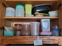 Cupboard full of plastic containers