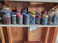 shelf full of nails, screws, nuts and bolt types