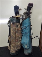 Two golf bags with assorted golf clubs
