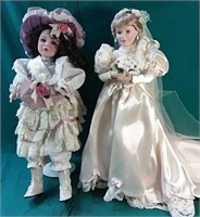 2 quality crafted collector porcelain dolls