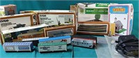 Vintage electric train set with cars and extras
