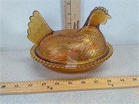 Amber glass hen on nest