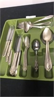 Various clean silver plated flatware