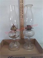2 oil lamps, one is eagle