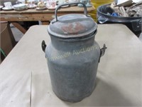 Vintage tin milk jug