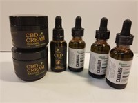 Various bottles of CBD oil and cream