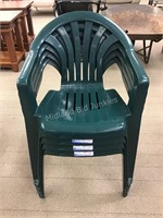 Four Like New Green Stackable Patio Chairs
