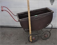 Vintage metal doll buggy decor