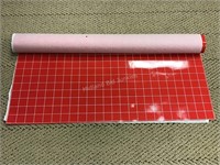 Roll of Red Vinyl Checkered Mat Like Material