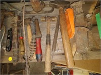 lot of primitive tools , hammer , knife , fire