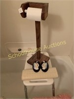Shower chair toilet paper roller and shower slip