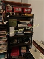 Metal shelving unit of crafting items and more