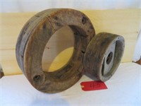 2 wooden pulley wheels