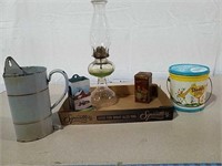 Metal can, match safe, kerosene lantern and