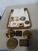 Various boxes and cases including powder, pill